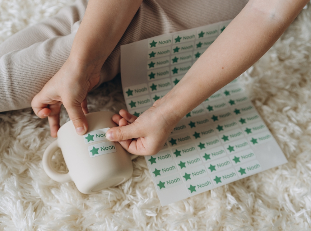 Applying a personalized name label to a kids' cup